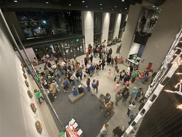 Auditorium lobby with patrons